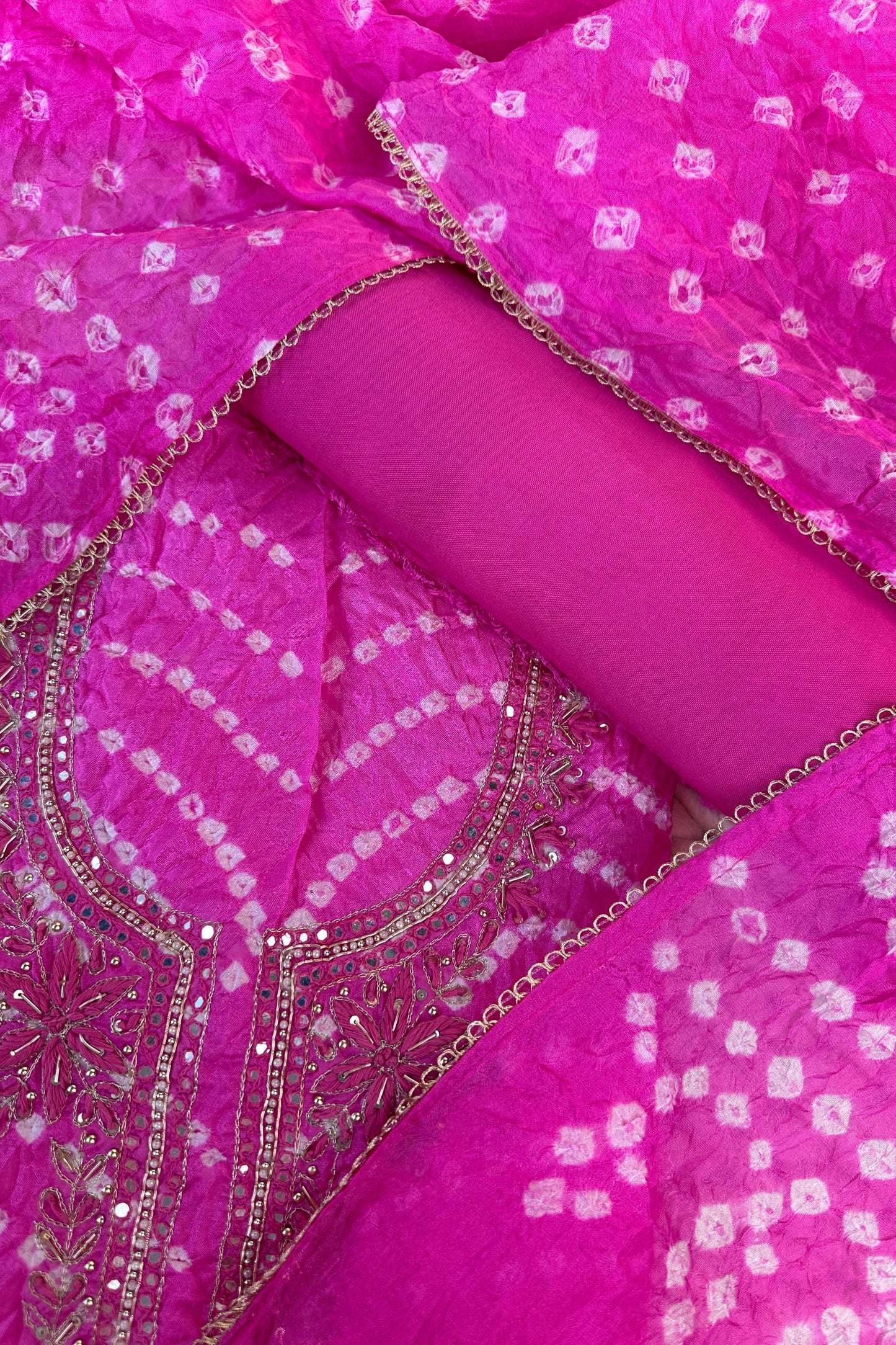 Pink Bandhni Silk Unstitched Suit With Thread And Mirror Handwork