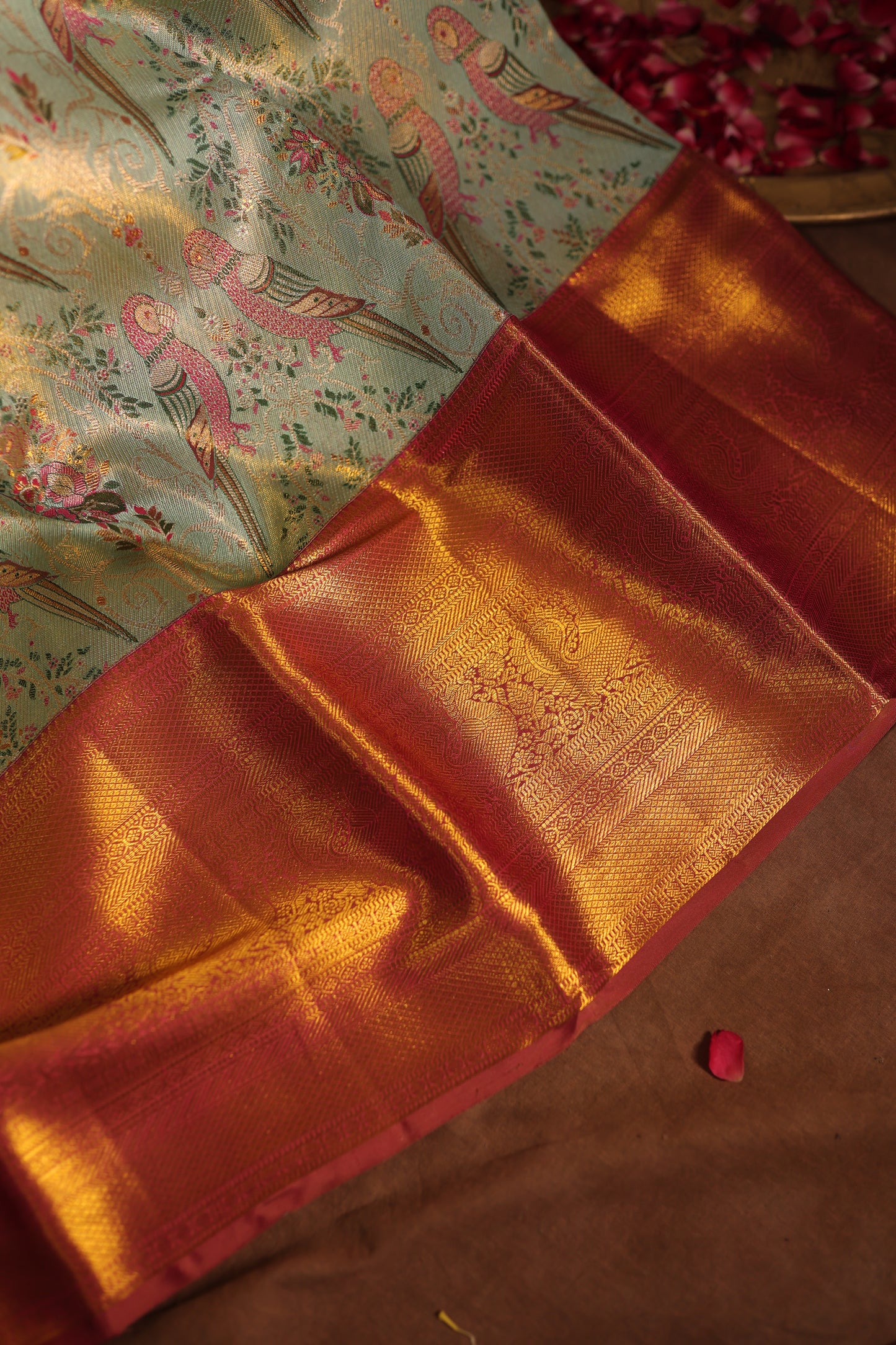 Kanjivaram silk Sage Green Parrot motif Zari Border Saree