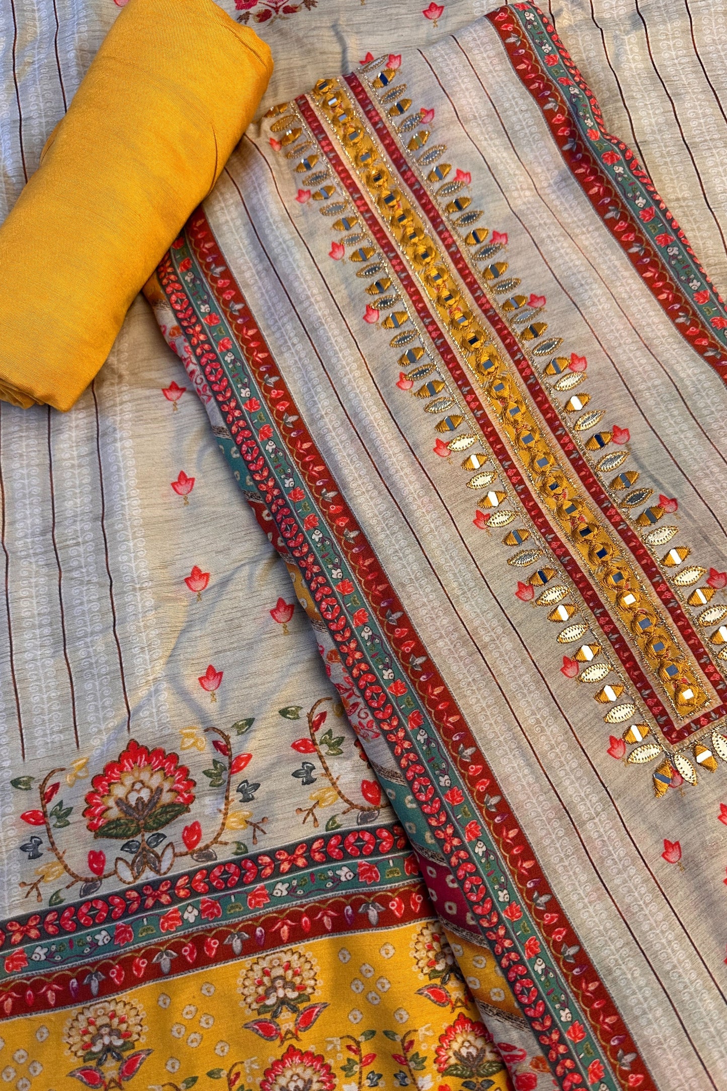 Muslin silk beige Digital Printed Mirror Work Hand Embroidered Unstitched Suit Set